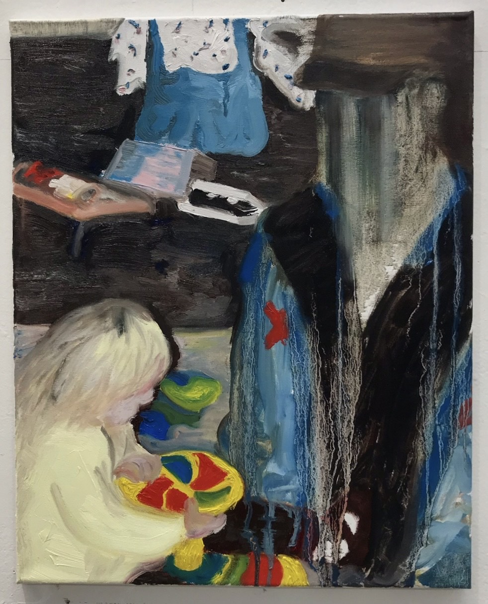 A little blonde child plays on a 'sit-and-spin' while a ghost-like figure looms over her