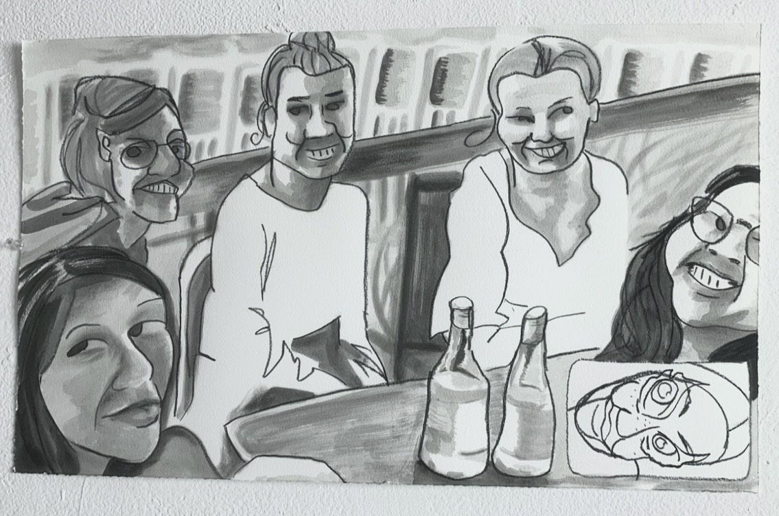 5 female-presenting figures sit around a table with two wine bottles, smiling while on a facetime call with another female-presenting face