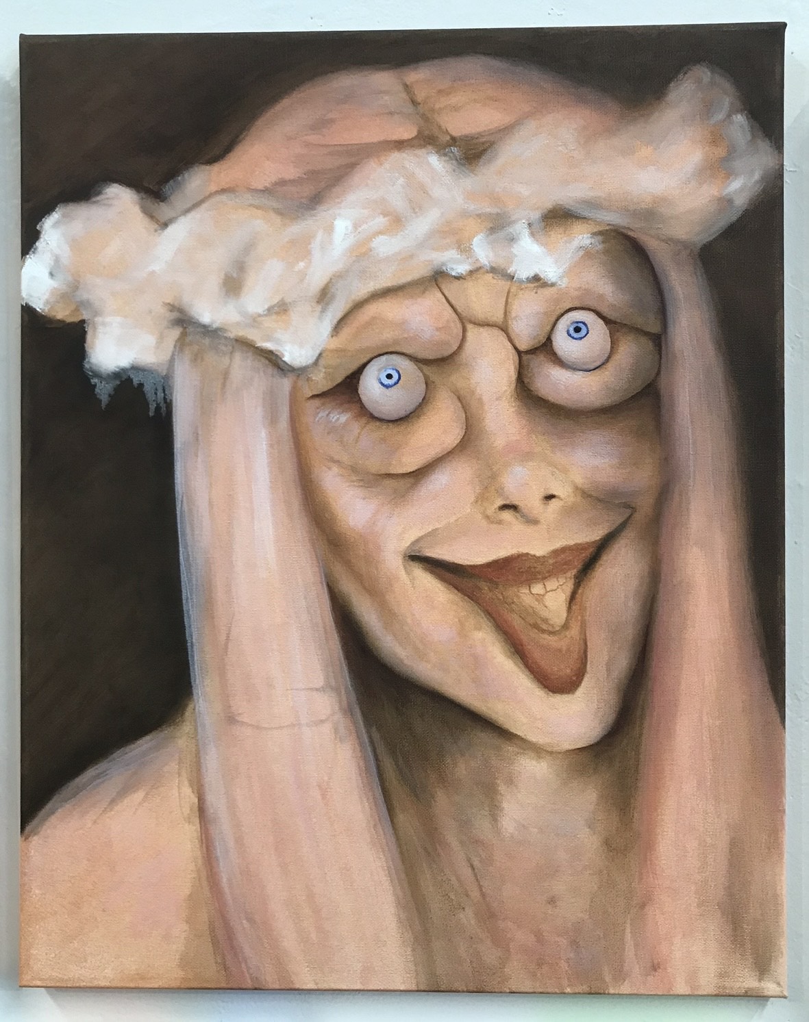 Grotesque woman with bulging eyes looks up towards the sky while smiling wide